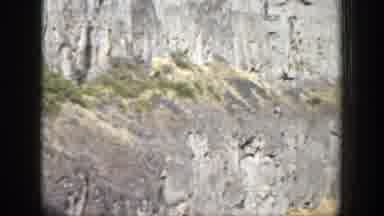 California (1937): Person Walking On Rocky Mountain People Watching Mountains