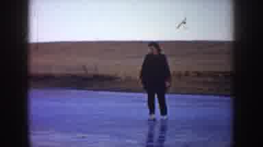 North Dakota (1953): People Ice Skating On Frozen Pond Twilight Hours Hill In