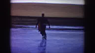 North Dakota (1953): People Skating On Frozen Pond Dog On Ice Car Parked On Ground