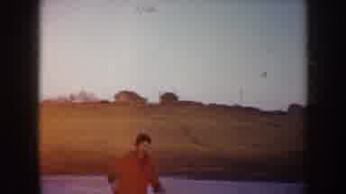 North Dakota (1953): Scenes Of Three People On Frozen Pond Skating And Losing