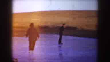 North Dakota (1953): Two Young Women And A Man Ice Skate On A Frozen Pond In A