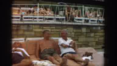 Los Angeles California (1961): People Laying Down Outside Sunbathing And Talking