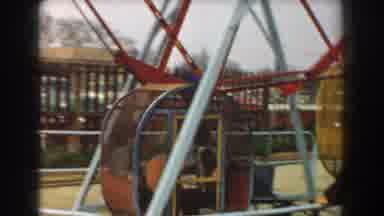 Los Angeles California (1961): Two People Riding In Ferris Wheel Ride On A Clear