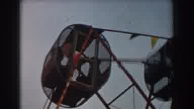 Los Angeles California (1961): Two Kids Inside A Cage Wheel In An Amusement Park