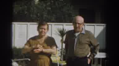Los Angeles California (1961): Couple Standing In The Garden With White Fence And