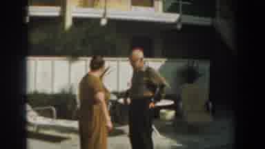 Los Angeles California (1961): Two Elderly Caucasians In A Backyard Or Poolside