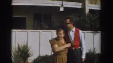 Los Angeles California (1961): A Man And A Woman Talking And Hugging Each Other In