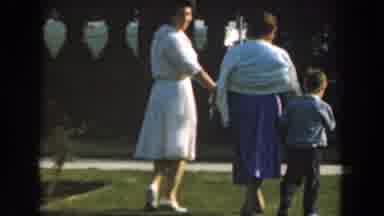 Los Angeles California (1961): Two Women And A Child Walking Hand In Hand On A