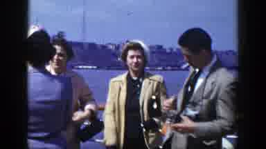 New York-1948: People On Riverboat And Crane Lifting Cargo