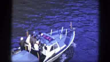 New York (1948): Sailors On The Side Of A Ship Watch A Boat Motor Off Followed By