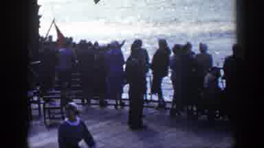 New York (1948): People Standing On The Deck Of A Ship Watching A Tugboat Push