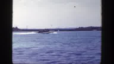 New York (1948): Old Footage Of Boat Cruising Along Coast In Calm Sea And Cloudy