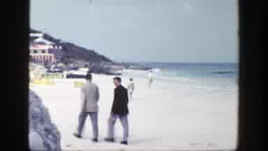 New York (1948): Two Smartly Dressed Men Walking On Beach Near The Sea