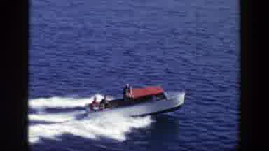 New York (1948): A Small Personal Boat Large Ship Large Building Water