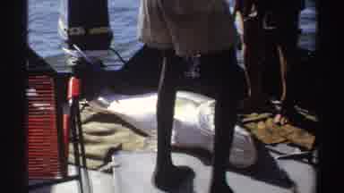 Nigeria-1969: Two Men Looking At The Big Fish They Just Caught Into The Boat