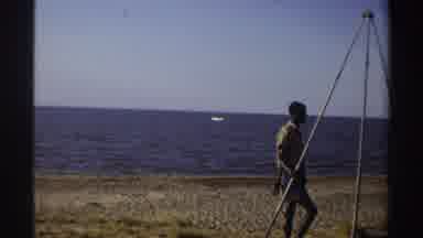 Nigeria (1969): Man Standing Class Iron Structure Side Seashore Man Building Side