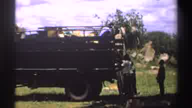 Nigeria (1969): A Group Of Men Unloading Furniture From A Truck And Carrying The