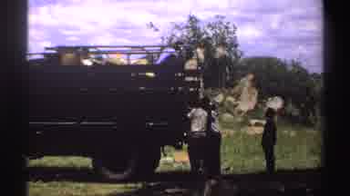 Nigeria (1969): Men Unloading Panel Truck Rural Boulders Brush Shadows Grass