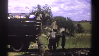 Nigeria (1969): Loading Box In To Car Men Sitting On The Chair