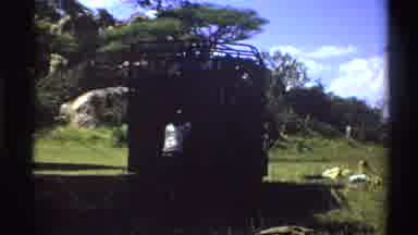 Nigeria (1969): People Getting Something Out Of A Truck In The Middle Of The