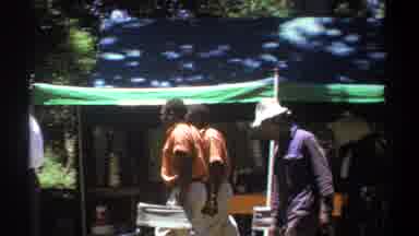 Kenya (1969): African Men In Professional Clothes Walking Together Past Tents