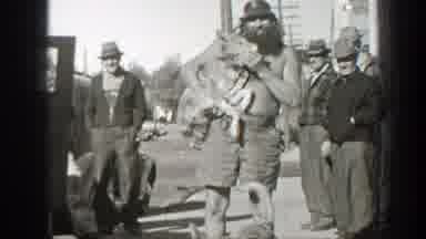 California-1939: Bearded Man Holds Pair Of Turtles On Sunny Day