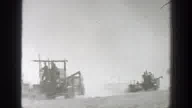 California (1939): View Of People Driving Harvester Machines On A Sunny Day