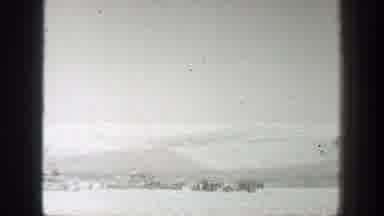 California (1939): Man Wearing White Hat Stands In Field Taking Pictures On A