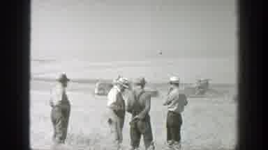 California (1939): Four Men Walking Through Field On A Bright Sunny Day