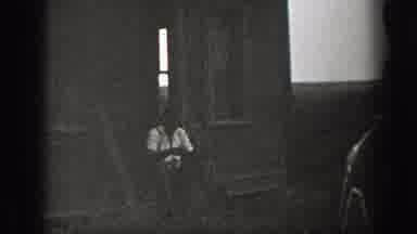 California (1939): Men Sitting Step Classic Home Group Riding Street Near Markets