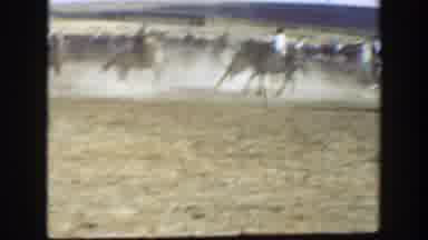 California (1939): Cowboys On Horseback In A Field Surrounded By People Followed