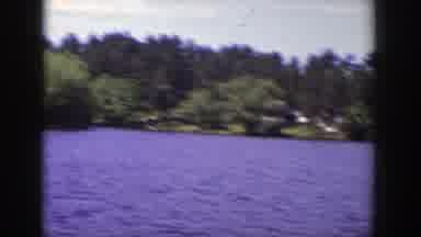 Wisconsin (1953): A Family On A Lake Taking In The Great Summer Day