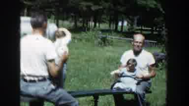 Wisconsin (1953): Two Men Playing On Game With Two Young Kids