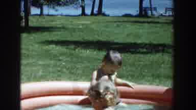 Wisconsin (1953): Young Children In Blow Up Pool And Then Swinging On Swing Set In