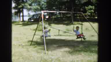 Wisconsin (1953): Kids Swinging On Swings