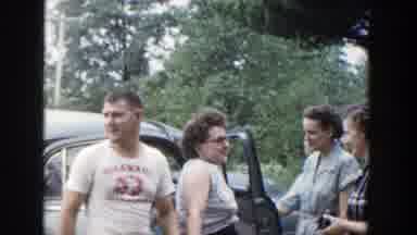 Wisconsin (1953): One Man And Three Women Talking And Laughing Standing Next To