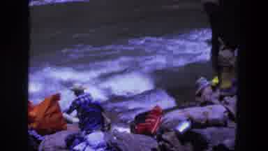 Utah (1969): People Sitting By The River Watching Currents And Surrounded By Rocks