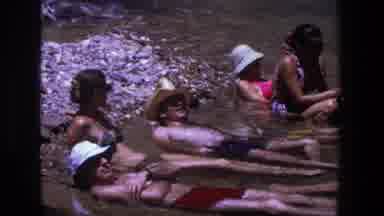 Utah (1969): Men And Women Relax In Body Of Water On A Warm Day