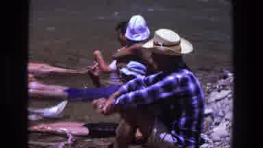 Utah (1969): People Resting With Feet In River Water On A Bright Sunny Day