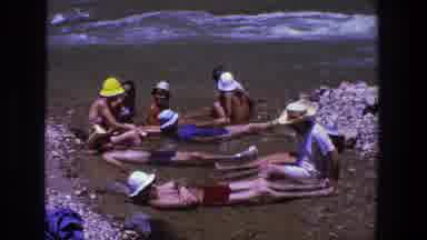Utah (1969): People Lounging In The Water On The Edge Of A River