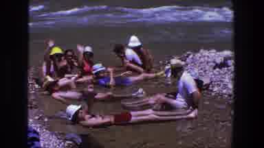 Utah (1969): Bathers Signaling To Camera In The Middle Of The River In Utah USA