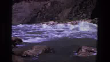Utah (1969): Close Up Of High Water Rushing Downstream Through An Arid Canyon