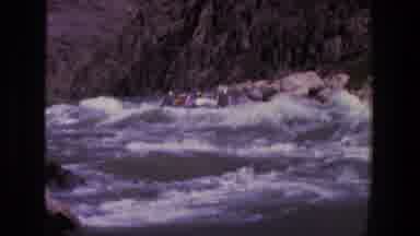 Utah (1969): People Riding Rough River Rapids In Grey Inflatable Boat On A Clear