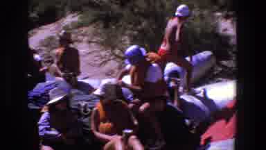 Utah (1969): Group Of People Interact On A Raft Near The Beach And A Huge Mountain