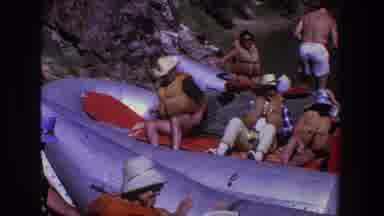 Utah (1969): People Resting In Silver Inflatable Boat On A Bright Sunny Day