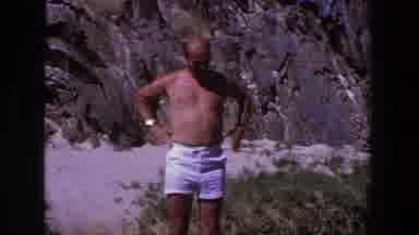 Utah (1969): Man Wearing White Shorts Looks Down At Ground With Hands On Hips