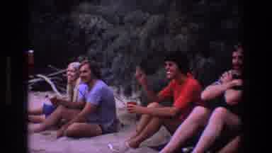 Utah (1969): People Outside View Old Video Sitting In Woods On The Sand