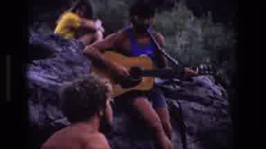 Utah (1969): People From The s Playing Guitar Outside Leaning On Rocks
