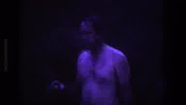 Utah (1969): Man Wearing White Shorts Sits On Rock Clapping Hands On Clear Evening