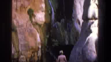 Utah (1969): Six People Looking At Tiny Trickle Of Water Over Tan Rocks